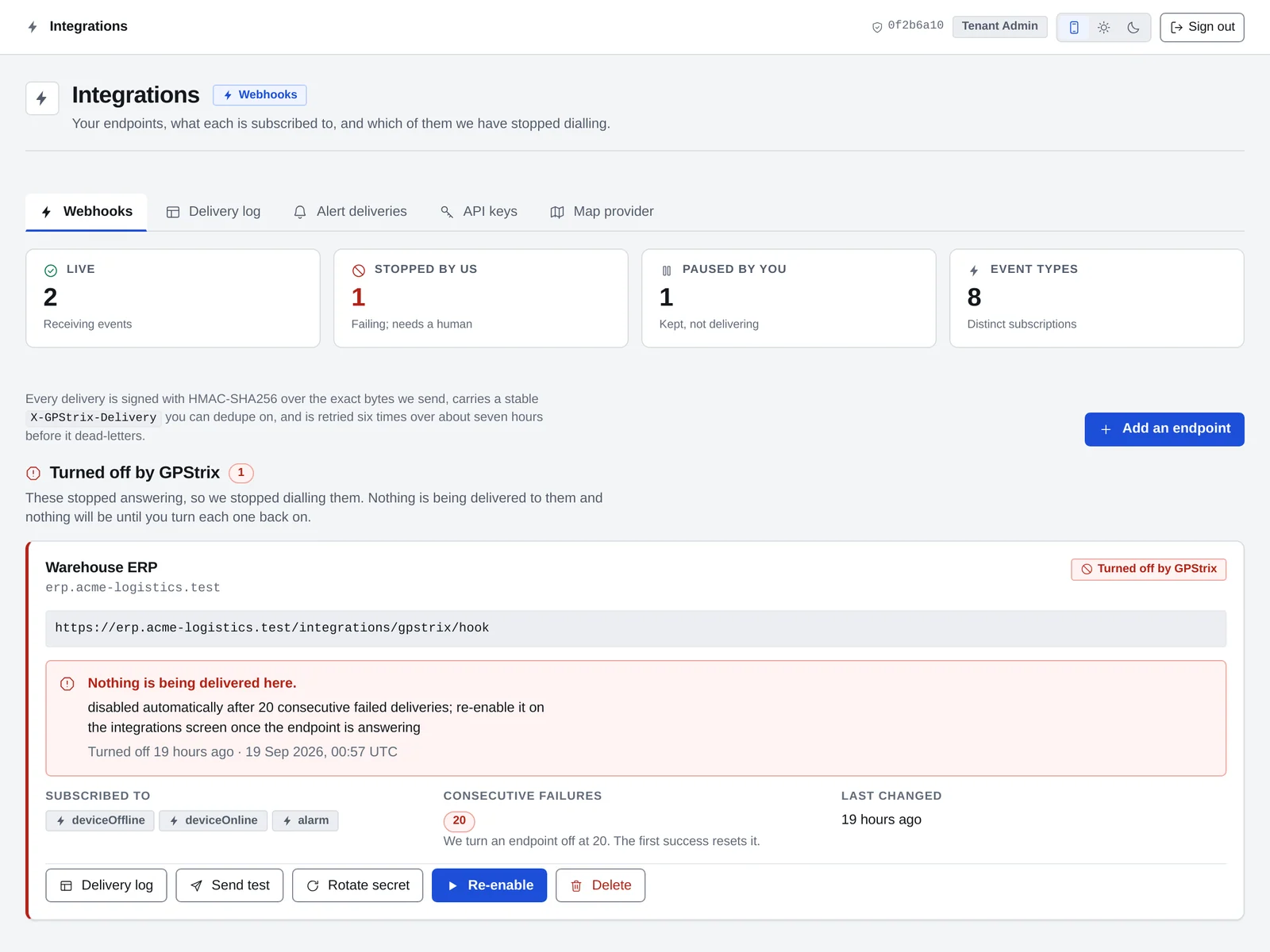 The integrations screen: two live webhook endpoints, one turned off by GPStrix after 20 consecutive failed deliveries with a button to re-enable it, and one paused.